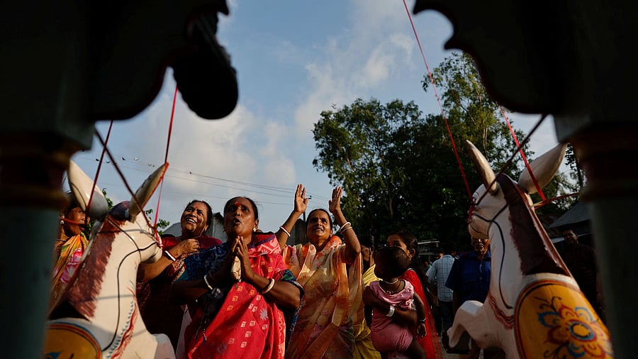 <div class="paragraphs"><p>Hindu devotees pray in front of the the Rath, a symbolic chariot, as they attend Rath Yatra festival, in Munshiganj, Bangladesh, June 27, 2025.</p></div>