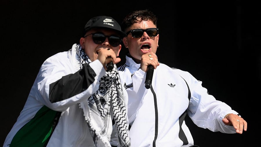 <div class="paragraphs"><p>Kneecap performs at Glastonbury Festival.</p></div>