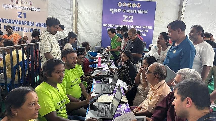 <div class="paragraphs"><p>Property owners at the e-khata mela in Byatarayanapura on Sunday. Around 4,000 people had arrived, and 1,679 applications were processed. </p></div>