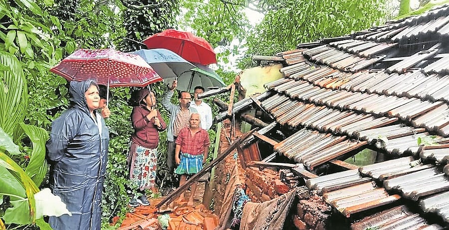 <div class="paragraphs"><p>A file photo of Deputy Commissioner Meena Nagaraj inspecting a house damaged near Mudigere. </p></div>