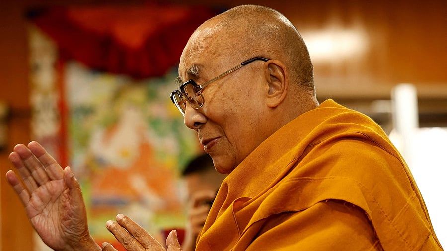 <div class="paragraphs"><p>The Dalai Lama, offers blessings to his followers at his Himalayan residence in the northern hill town of Dharamshala.</p></div>