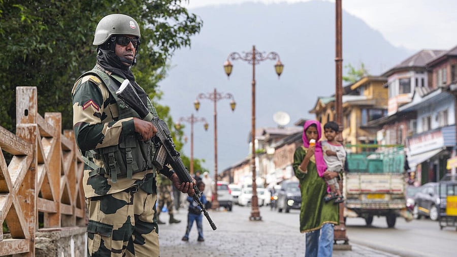 <div class="paragraphs"><p>A BSF official keeps a vigil as security has been beefed up ahead of the annual ‘Amarnath Yatra’, at Pahalgam, in Anantnag district.</p></div>