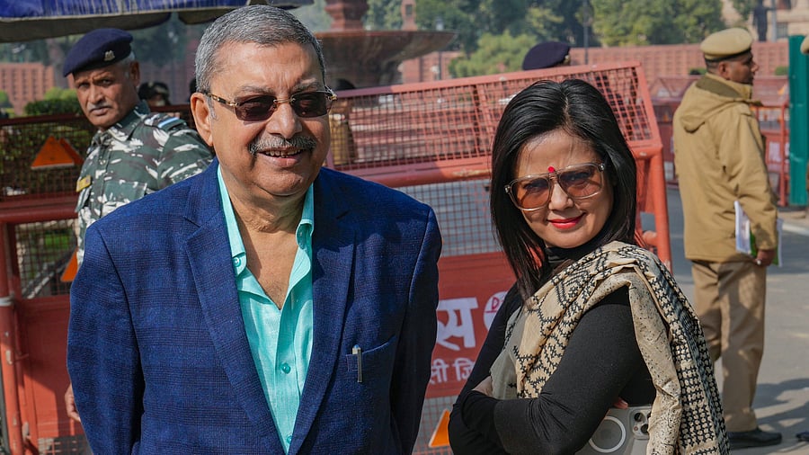 <div class="paragraphs"><p>TMC MP Kalyan Banerjee with former MP Mahua Moitra at Vijay Chowk, in New Delhi  </p></div>