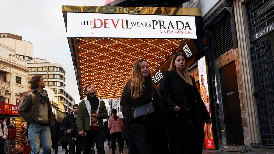 <div class="paragraphs"><p>People walk past an advertisement for The Devil Wears Prada at the Dominion theatre in London, Britain February 27, 2025. For representational purposes.</p></div>