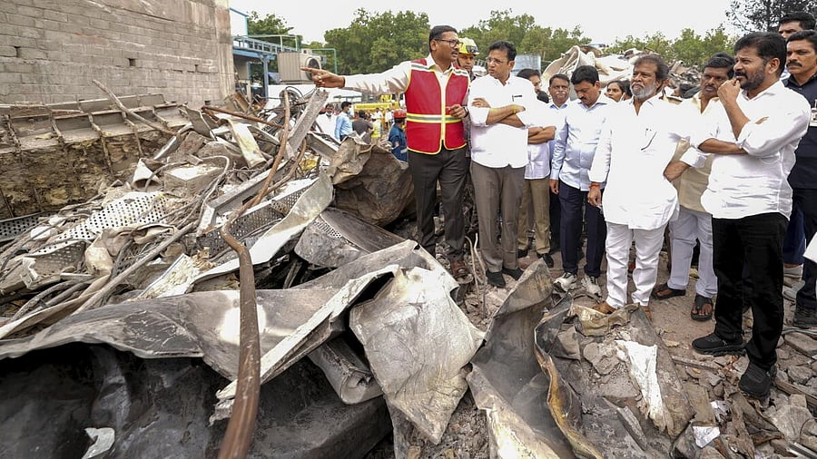 <div class="paragraphs"><p>Telangana Chief Minister A Revanth Reddy with others during an inspection at the site of an explosion at the Sigachi Industries' pharma plant, in Sangareddy district, Telangana, Tuesday, July 1, 2025</p></div>