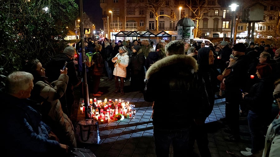 <div class="paragraphs"><p>File Photo: People light candles during a protest after  two people, one a child, were killed in a knife attack, in Aschaffenburg, Germany.</p></div>