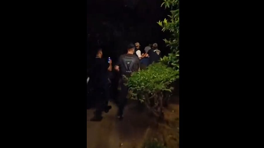 <div class="paragraphs"><p>Police officers detaining cartoonist Dogan Pehlevan</p></div>