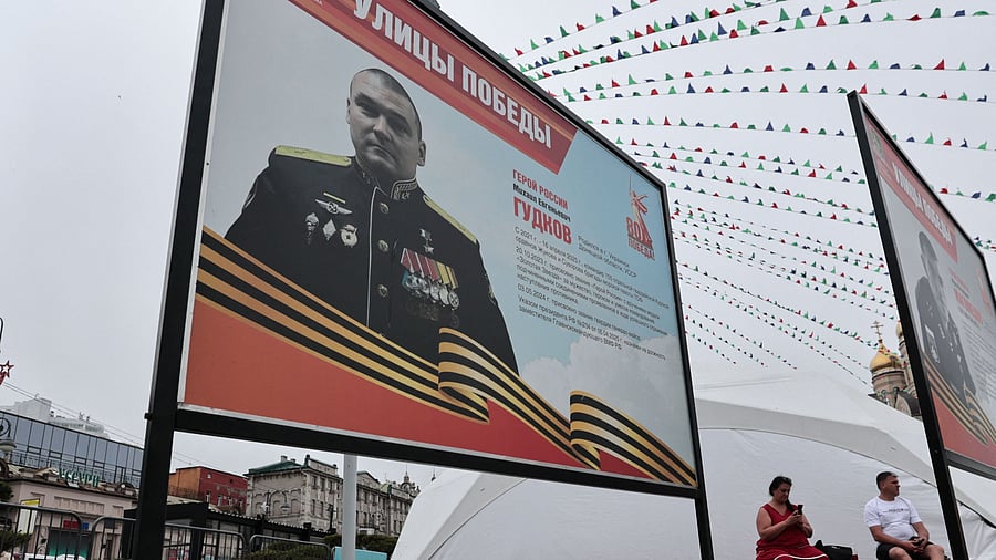 <div class="paragraphs"><p>A view shows flowers placed near a board with a photograph of Major General Mikhail Gudkov, the deputy head of the Russian Navy who, according to local authorities, was recently killed in the Kursk region amid Russia-Ukraine conflict, at an exhibition of distinguished Russian soldiers' portraits in the far eastern city of Vladivostok, Russia</p></div>