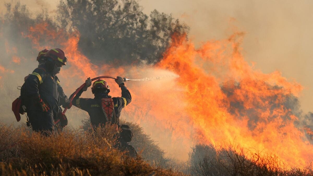 <div class="paragraphs"><p>Wildfire burns in Ierapetra on the island of Crete.</p></div>