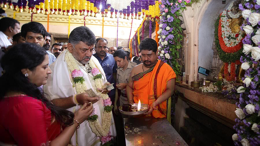Deputy Chief Minister D K Shivakumar offers prayers to Chaumundeshwari atop Chamundi Hill in Mysuru on Friday.