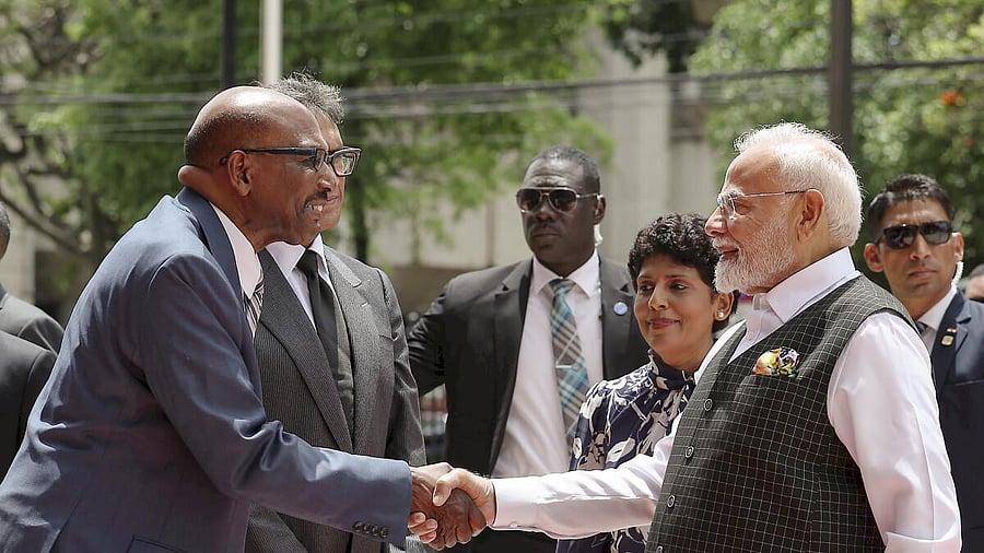 <div class="paragraphs"><p>Prime Minister Narendra Modi being greeted upon his arrival at the Parliament of Trinidad and Tobago.</p></div>