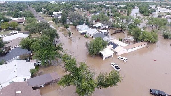 <div class="paragraphs"><p>A drone view shows flooded houses, following torrential rains that unleashed flash floods along the Guadalupe River in San Angelo, Texas.</p></div>