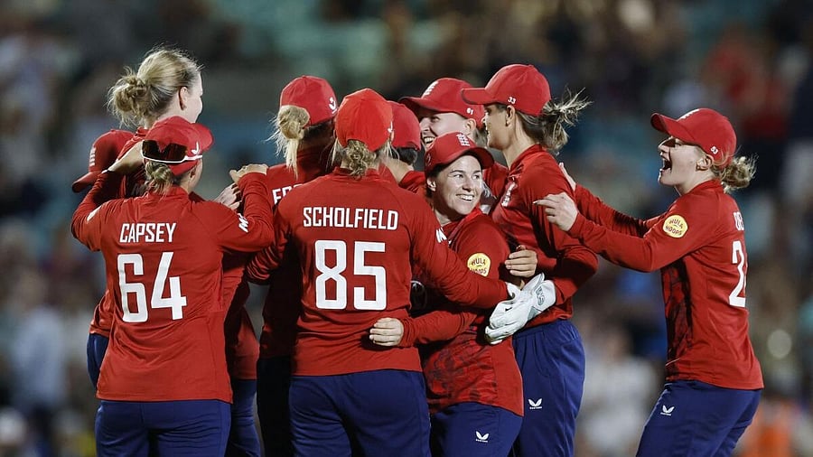 <div class="paragraphs"><p>England players celebrate after the match.</p></div>