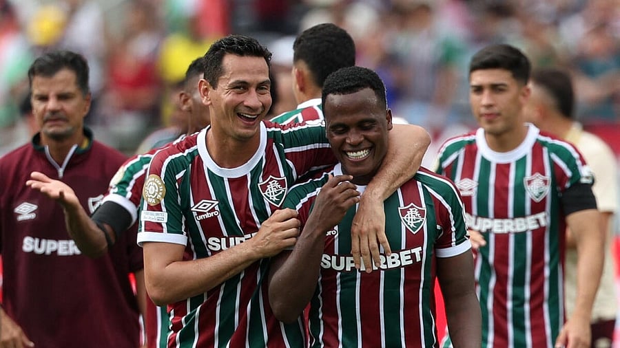 <div class="paragraphs"><p>Fluminense's Ganso and Jhon Arias celebrate after the match</p></div>
