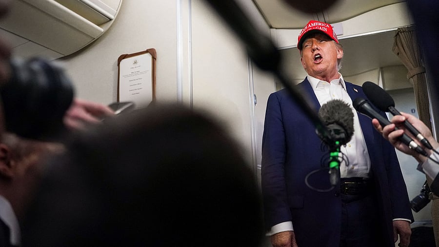 <div class="paragraphs"><p>US President Donald Trump speaks to members of the media on board Air Force One on the way to New Jersey, US, July 4, 2025. </p></div>