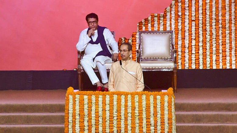 <div class="paragraphs"><p>Maharashtra Navnirman Sena (MNS) chief Raj Thackeray, back, and Shiv Sena (UBT) chief Uddhav Thackeray during a joint victory rally, titled 'Awaj Marathicha'</p></div>