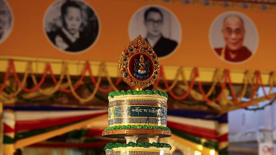 <div class="paragraphs"><p>A view shows a cake topper on a 9-tier cake, to celebrate the 90th birthday of Tibetan spiritual leader, the 14th Dalai Lama, at the Tsuglagkhang, also known as the Dalai Lama Temple complex, in the northern town of Dharamshala, India, July 6, 2025.</p></div>
