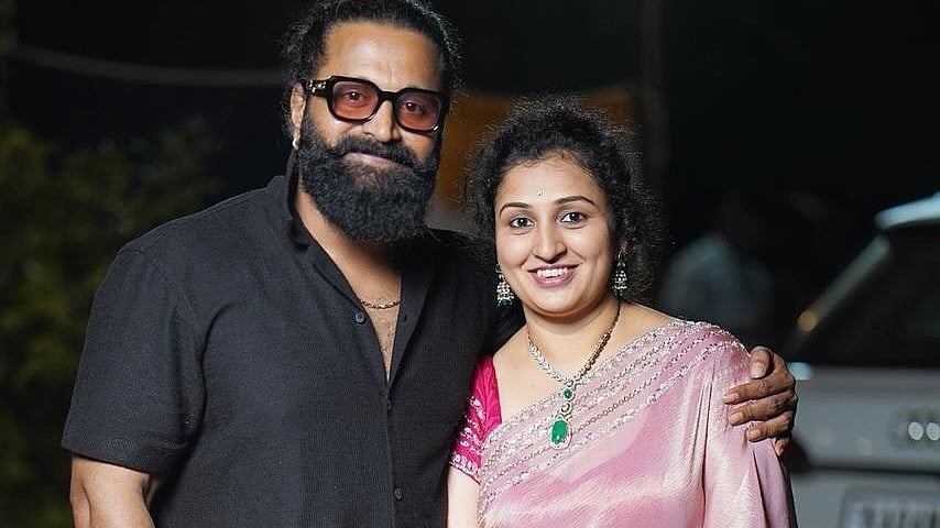 <div class="paragraphs"><p>Rishab Shetty with his wife Pragathi.</p></div>