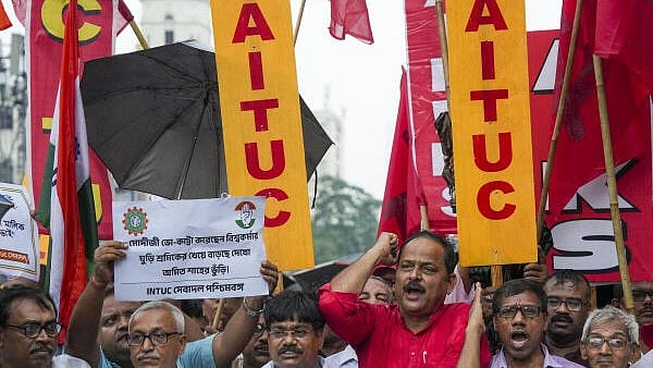 <div class="paragraphs"><p>Members of various trade unions raise slogans during a rally in support of their proposed nation-wide strike on July 9.&nbsp;</p></div>