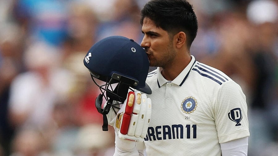 <div class="paragraphs"><p>India's Shubman Gill kisses his helmet and celebrates after completing his century.</p></div>