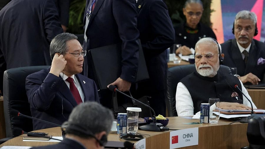 <div class="paragraphs"><p>Prime Minister Narendra  Modi and China's Premier Li Qiang, attend the opening meeting of BRICS Summit.</p></div>