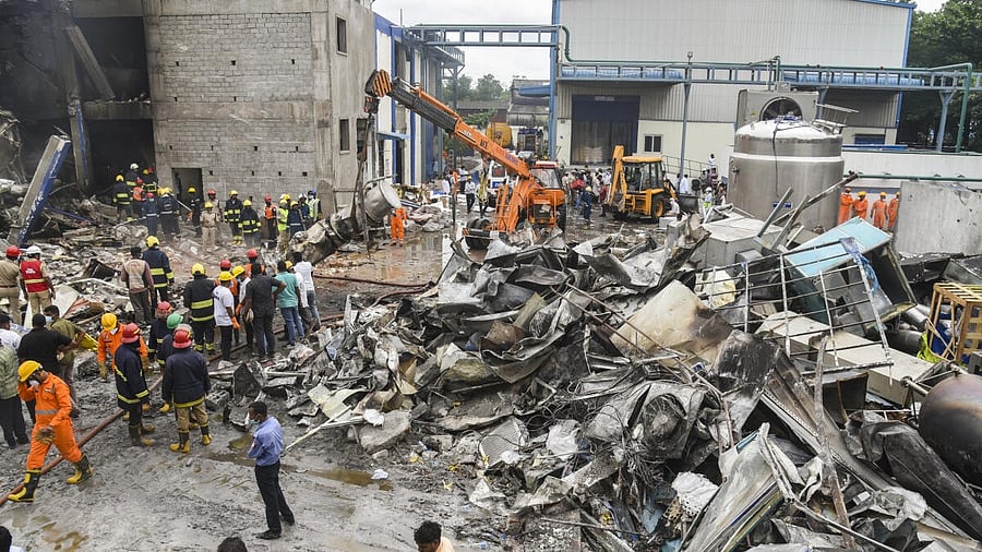 <div class="paragraphs"><p>Emergency services personnel at the site after an explosion at a pharma plant</p></div>
