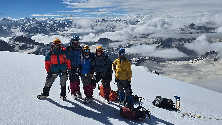 (From left) Nimish Singh, Santhosh Devarajappa, Dr Chinmayee J T, Dhruv Aryaman and Arjun Srivatsa reached the Deo Tibba peak at 8.50 am on July 1.