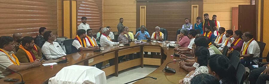 <div class="paragraphs"><p>Kannada Development Authority Chairman Dr Purushottam Bilimale at a meeting with Kannada activists in Belagavi on Thursday. </p></div>