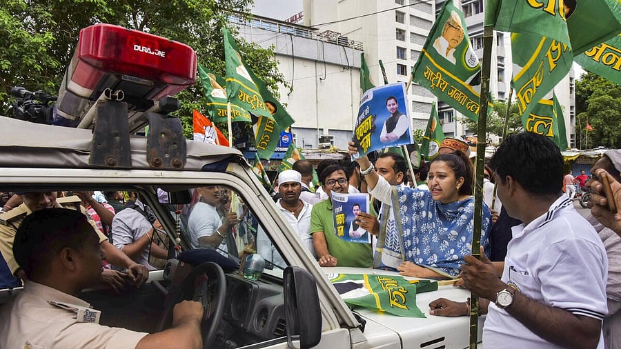 <div class="paragraphs"><p>INDIA bloc workers block the way of a police vehicle during their protest against the special intensive revision (SIR) of electoral rolls,</p></div>