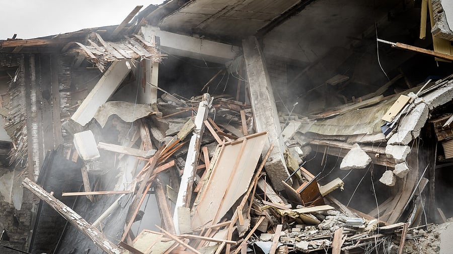 <div class="paragraphs"><p>Representative image showing a collapsed building</p></div>