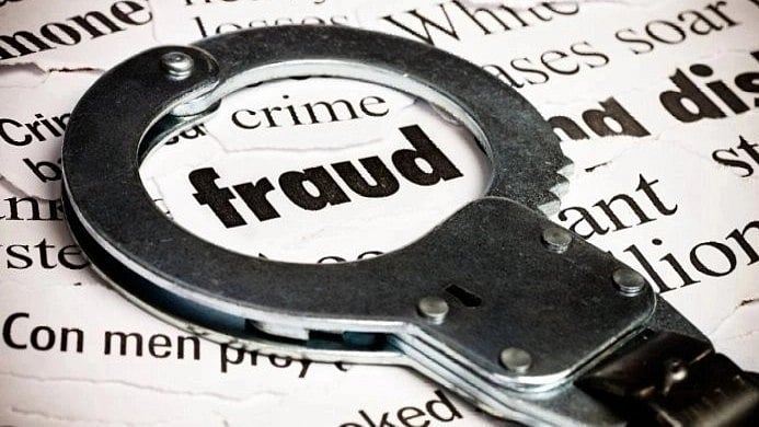 <div class="paragraphs"><p>Image showing a handcuff and the word fraud. (For representational purposes.)</p></div>