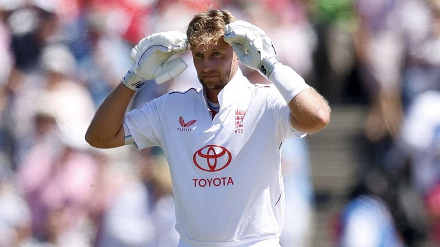 <div class="paragraphs"><p>Joe Root celebrates after completing his century.</p></div>