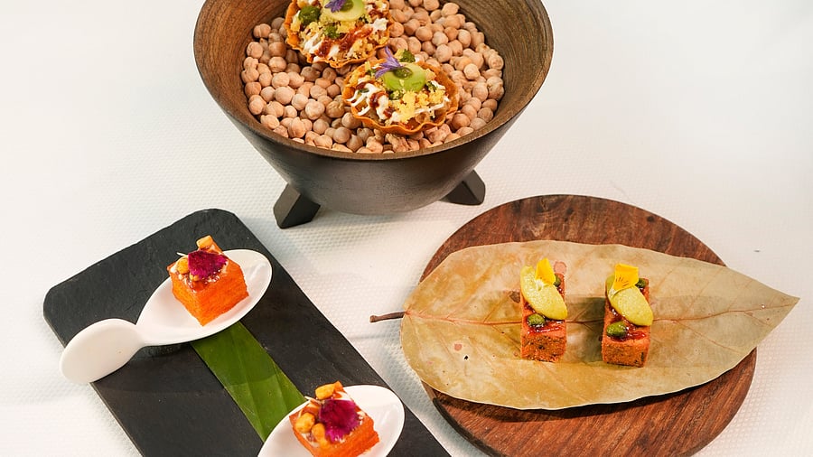 <div class="paragraphs"><p>Aloo tikki and chana dal pav khakra served with Vatana Dhokla and Kothimbir Vadi&nbsp;at Indian Accent. </p></div>