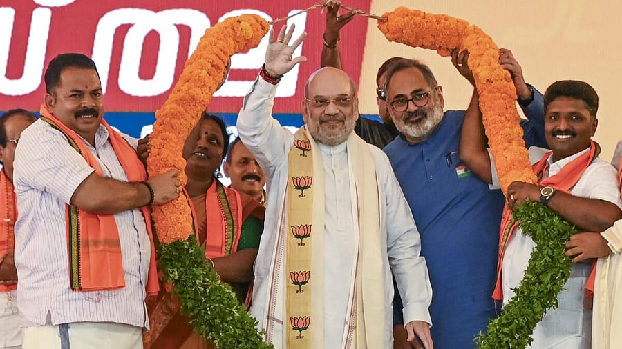 <div class="paragraphs"><p>Union Home Minister Amit Shah being felicitated during a public meeting, in Thiruvananthapuram.</p></div>