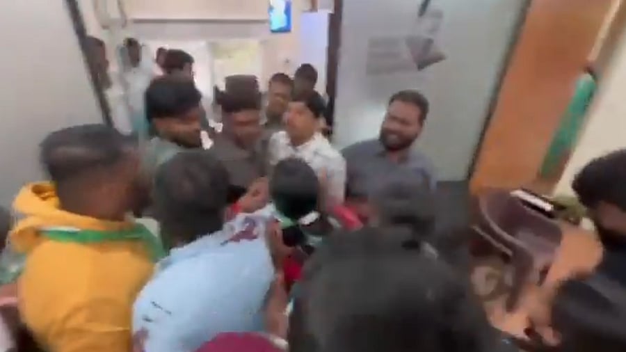 <div class="paragraphs"><p>A screengrab from the video of Jagruthi workers allegedly vandalising and roughing up people in the MLC office. </p></div>