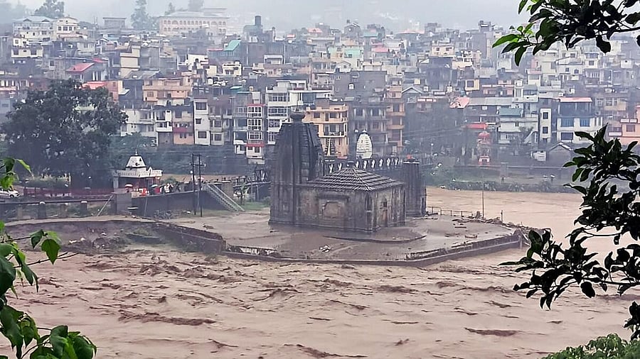 <div class="paragraphs"><p>The Panchvaktra Mahadev Temple at the confluence of the Beas and Suketi rivers which are in spate after a cloudburst in Mandi district of Himachal Pradesh.</p></div>