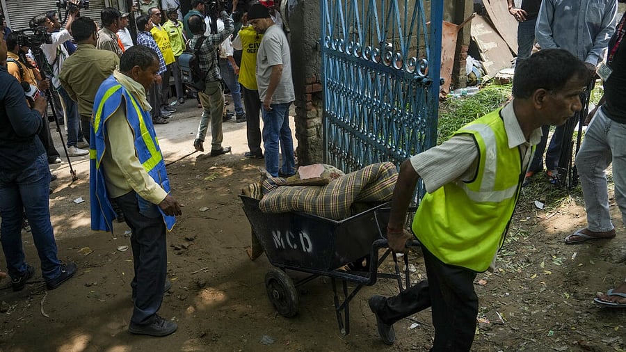 <div class="paragraphs"><p>Rescue operation underway after a four-storey building collapsed at Janta Colony, at Welcome area in New Delhi on Saturday.</p></div>
