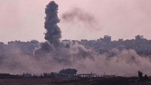 <div class="paragraphs"><p>Smoke rises following an explosion in Gaza, as seen from the Israeli side of the Israel-Gaza border.</p></div>