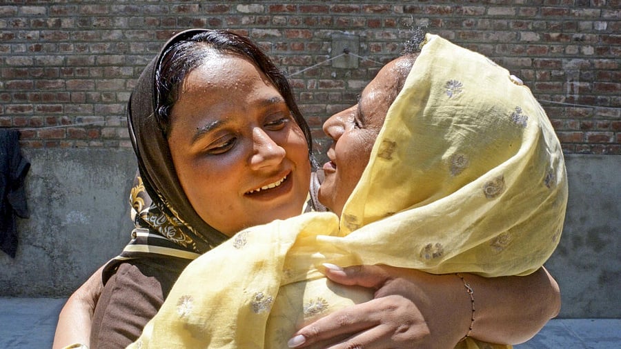 <div class="paragraphs"><p>MBBS student Sabah Rasool, left, is welcomed by her mother after returning home following her evacuation from Iran under Operation Sindhu, amid the Israel-Iran conflict, in Srinagar, Thursday, June 19, 2025. The evacuation was coordinated by the Ministry of External Affairs. </p></div>