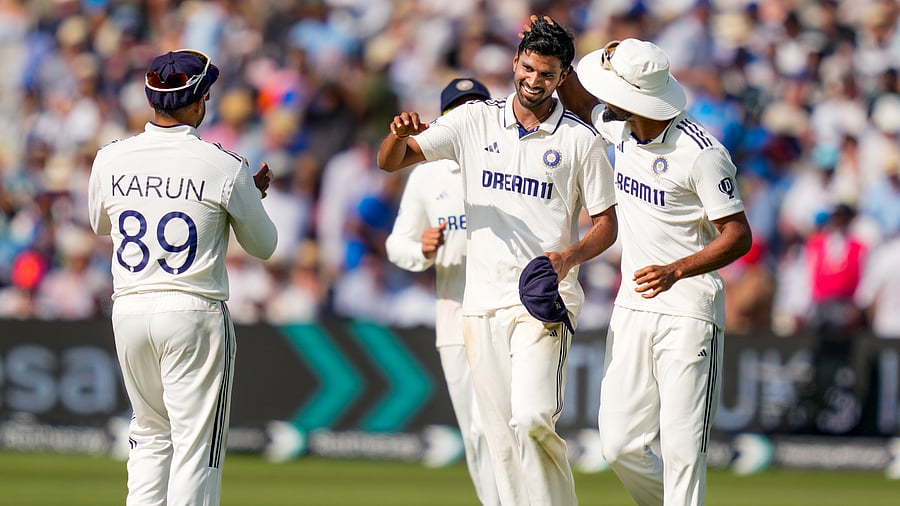 <div class="paragraphs"><p>Washington Sundar celebrates with teammates after taking the wicket of England's batter Shoaib Bashir during the fourth day of the third Test match between India and England, at the Lord's Cricket Ground.</p></div>