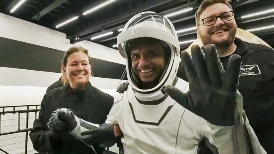 <div class="paragraphs"><p> Shubhanshu Shukla greets as he reaches Earth with other crew members of the mission aboard the Dragon spacecraft that splashed down off California</p></div>