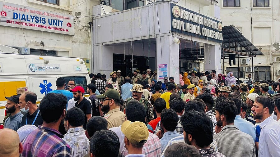 <div class="paragraphs"><p>People gather at the Government Medical College and Hospital where injured victims are being treated, in Doda district</p></div>