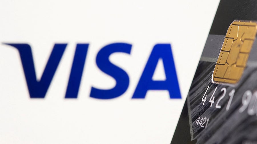 <div class="paragraphs"><p>FILE PHOTO: Credit card is seen in front of displayed Visa logo in this illustration taken, July 15, 2021. </p></div>