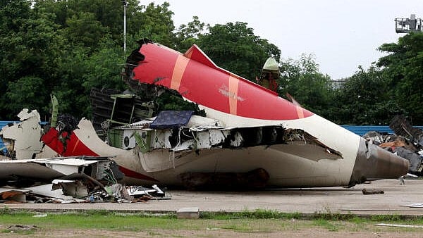 <div class="paragraphs"><p>Wreckage of the Air India Boeing 787-8 Dreamliner plane sits on the open ground, outside Sardar Vallabhbhai Patel International Airport, where it took off and crashed nearby shortly afterwards, in Ahmedabad.</p></div>
