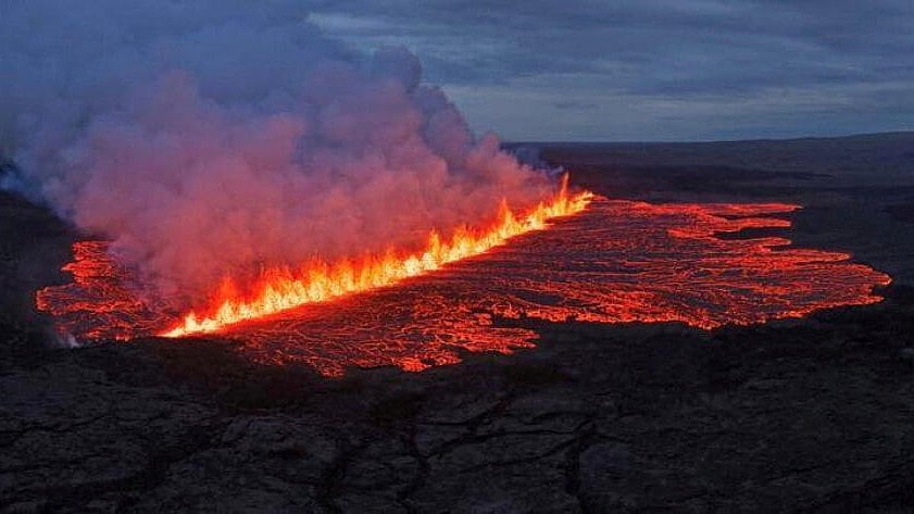 <div class="paragraphs"><p>Lava emerges through a fissure following a volcano eruption near Grindavik</p></div>
