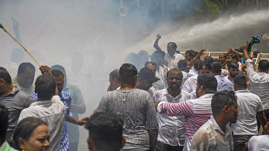 <div class="paragraphs"><p>Police personnel use water cannons to disperse BJD workers protesting over the death of a college student in Odisha's Balasore</p></div>