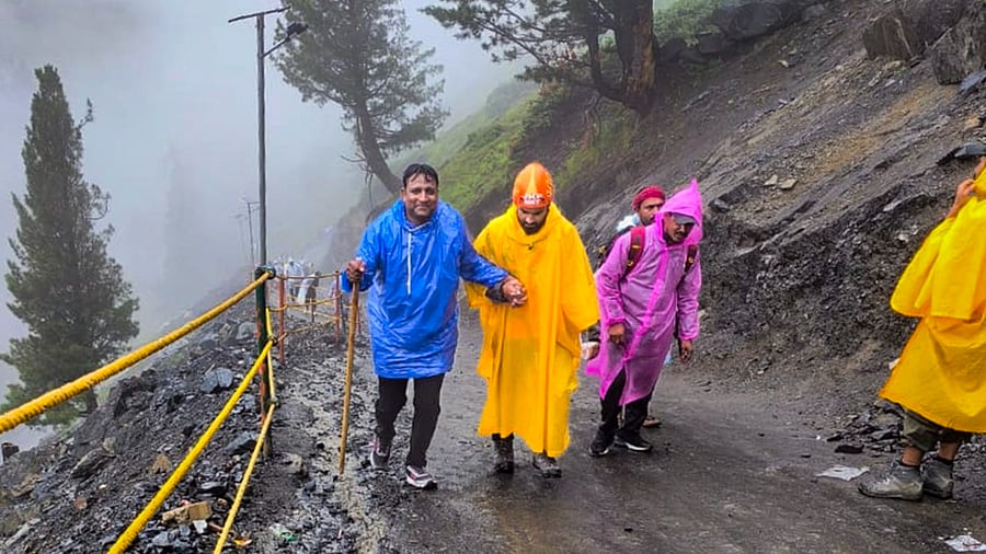 <div class="paragraphs"><p>A member of Mountain Rescue Team (MRT) assists a pilgrim during the annual Amarnath Yatra, in Jammu and Kashmir, Wednesday, July 16, 2025. Image for representational purposes.</p></div>