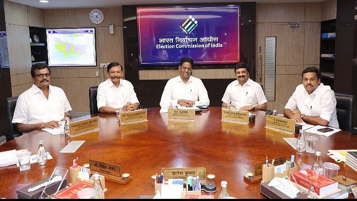 <div class="paragraphs"><p>DMK MPs with Election Commission officials. </p></div>