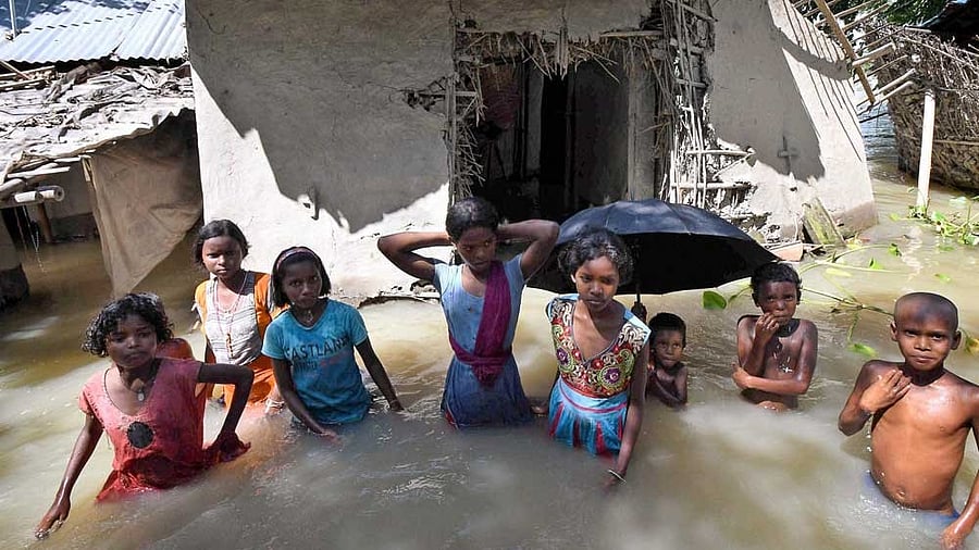 <div class="paragraphs"><p>Representative image of children in floodwater</p></div>