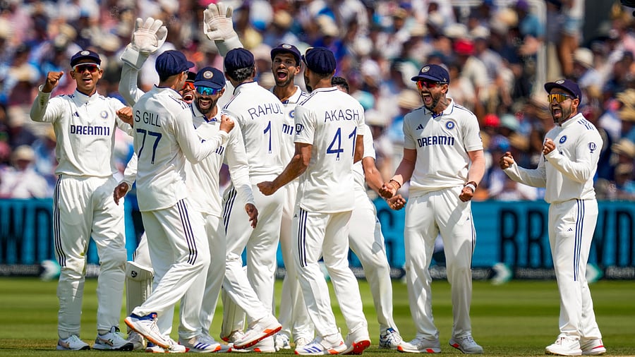 <div class="paragraphs"><p>London: India's players celebrate after a successful DRS review for the wicket of England's Ollie Pope on the fourth day of the third test cricket match between India and England, at the Lord's Cricket Ground, in London, Sunday, July 13, 2025.</p></div>